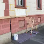 a ladder next to a building